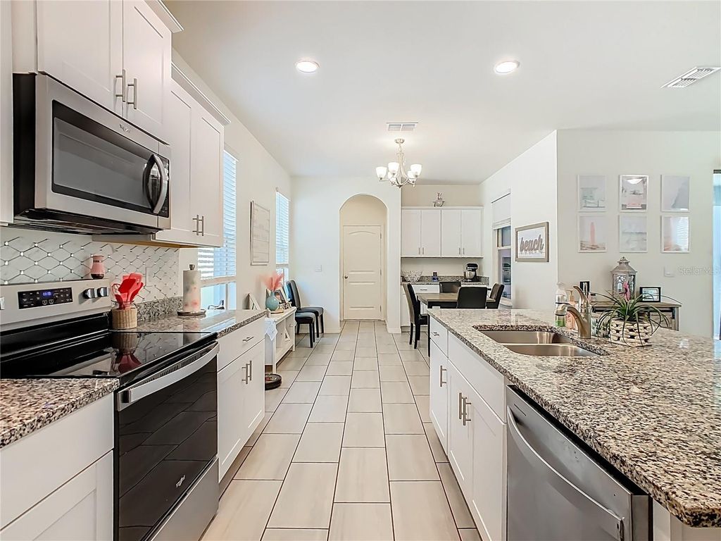 Photo of 16230 Carraway Bay Alley, Winter Garden, FL 34787 (MLS # NS1087076)