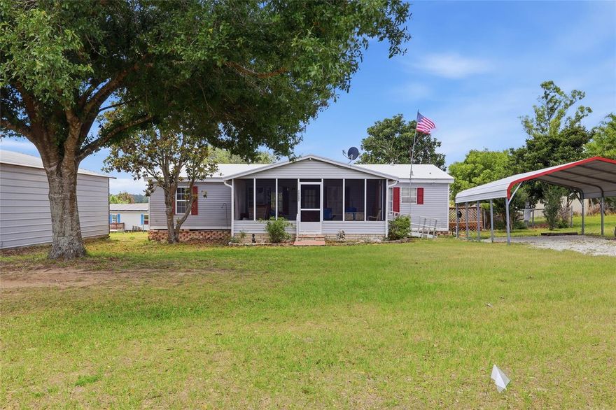 Welcome to your next chapter at 14647 Billie Ln Tucked away in the peaceful countryside of Dade City, this property isn’t just a home it’s your personal retreat from the everyday hustle. Featuring 3 bedrooms and 2 baths, this home offers the perfect blend of space and functionality. Start your mornings or wind down your evenings on the great screened-in front porch, where you can enjoy the Florida breeze without the bugs.  A convenient carport adds everyday ease and protection for your vehicle.  Whether you're dreaming of backyard BBQs, a space for your toys and hobbies, or just some extra breathing room, you’ll find it here. Step inside to discover a refreshed interior featuring new flooring and the peace of mind that comes with a new water heater installed in 2026 Natural light pours in, and the layout flows effortlessly from one room to the next, creating a space that feels both functional and welcoming. But the real showstopper? A massive 30x40 storage shed that’s ready for whatever you need complete with electric and two large roll-up doors. Whether you're a car enthusiast, need a workshop, want extra storage for equipment, or dream of the ultimate hobby space, this setup delivers serious flexibility and value. And while it feels like a private escape, you’re still just a short drive from local shops, dining, and everything that makes Dade City such a hidden gem. If you’ve been craving a little more space, a little more peace, and a lot more charm… Billie Ln is calling your name. Come see it for yourself you might not want to leave!!!