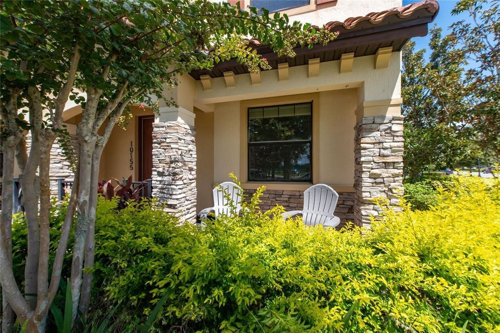 Photo of 10155 Eagle Creek Center Boulevard, Orlando, FL 32832 (MLS # O6357091)