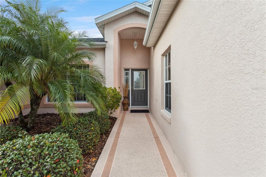 Photo of 4803 Sawgrass Lake Circle, Leesburg, FL 34748 (MLS # G5106470)