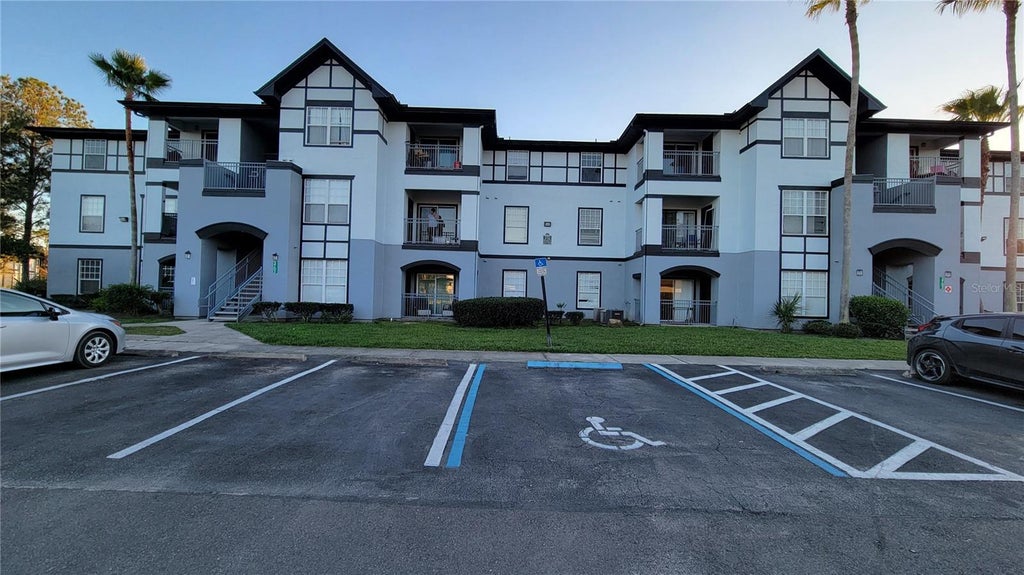 Photo of 3702 Palm Desert Lane #5427, Orlando, FL 32839 (MLS # O6442600)