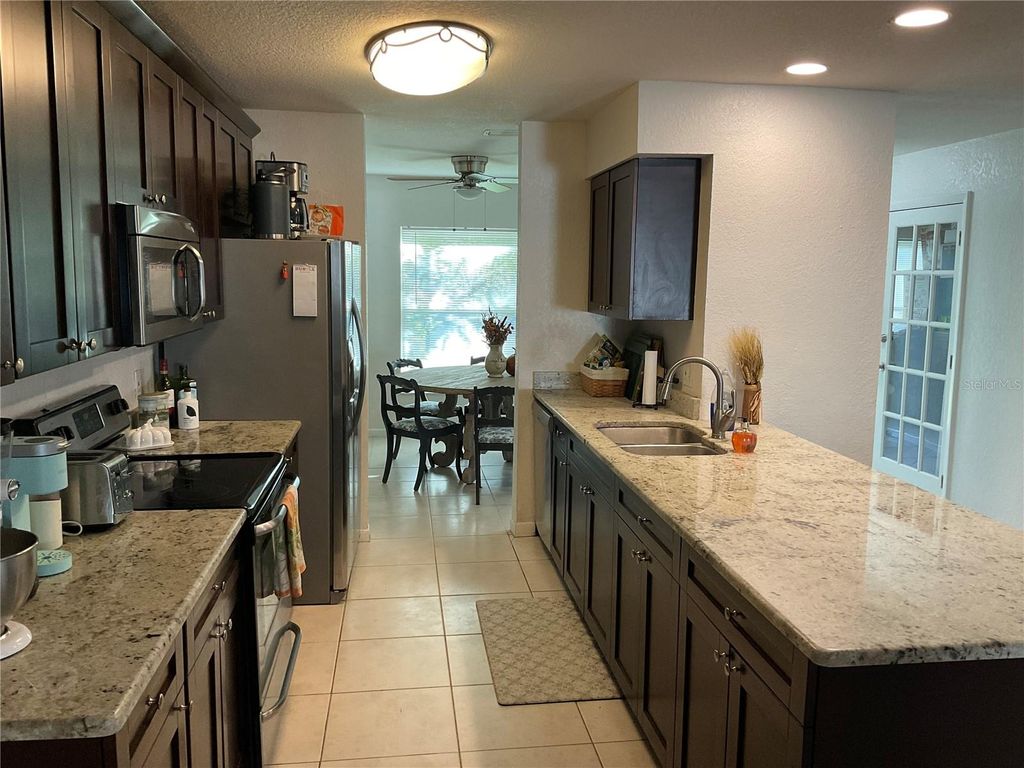 Photo of 4403 Willowrun Lane, Tampa, FL 33624 (MLS # TB8476631)