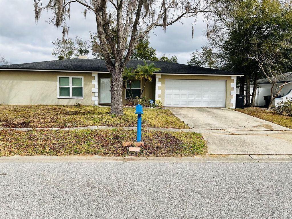 Photo of 4403 Willowrun Lane, Tampa, FL 33624 (MLS # TB8476631)