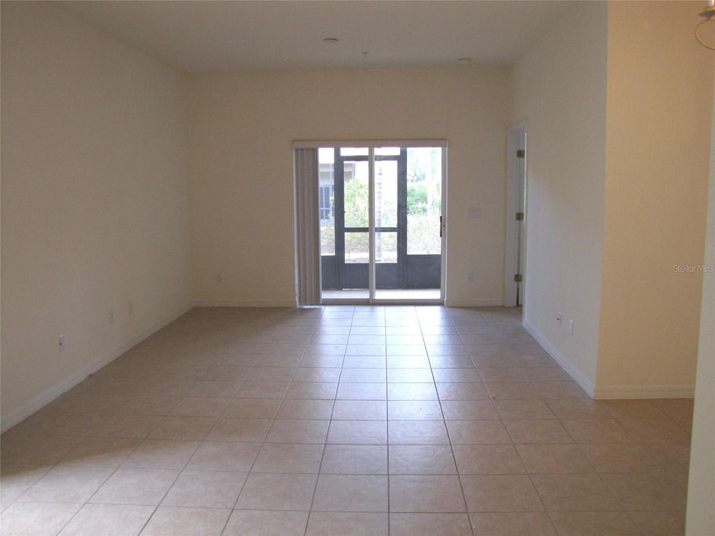 Photo of 7513 Bliss Way #33, Kissimmee, FL 34747 (MLS # O6393821)