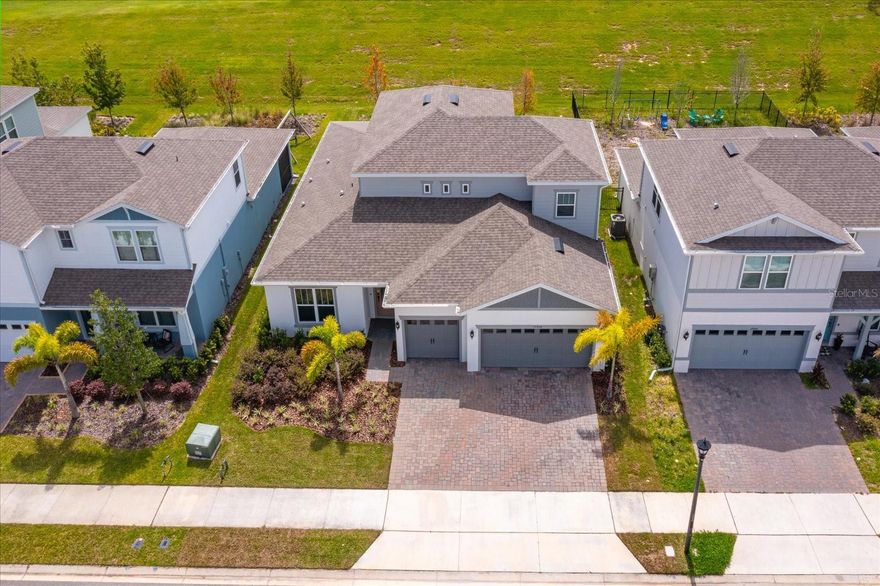 *Move-In Ready Luxury in Willow Ridge* Why wait on new construction when this brand-new Ashby Grand residence is ready for you now? Situated in the exclusive gated community of Willow Ridge in Montverde, this home blends modern design, everyday functionality, and versatile living spaces—crafted for the way you live today. Boasting 4 bedrooms, 3.5 baths, a dedicated office, and an upstairs bonus suite, this home offers the perfect balance of privacy and connection. The split floor plan places the expansive owner’s retreat on one side, while two additional bedrooms with a shared bath create a comfortable wing for family or guests. The main level is designed for seamless single-story living, while the upper floor adds flexible space with a fourth bedroom, full bath, and oversized bonus room—ideal for teens, guests, or a private retreat. Every detail speaks to quality: wood-look tile throughout the main areas, a gourmet kitchen with modern finishes, and a screened paved lanai with retractable screen, perfect for enjoying Florida evenings. The paved driveway enhances curb appeal, while natural gas appliances add efficiency. Beyond your doorstep, Willow Ridge offers resort-style amenities including a community pool, cabana, gated entry, high-speed internet, and streaming TV—all with a low HOA and no CDD fees. Just minutes from Montverde Academy and the exciting growth corridor of Minneola—featuring Publix, Crooked Can at Hill City Center, and the upcoming Advent Health campus—this home is both a retreat and a smart investment. Skip the wait. Step into elevated living now. Note : Current Builder is selling the same floor plan for $810,000 , this home is priced $70,000 LESS !!!!!
