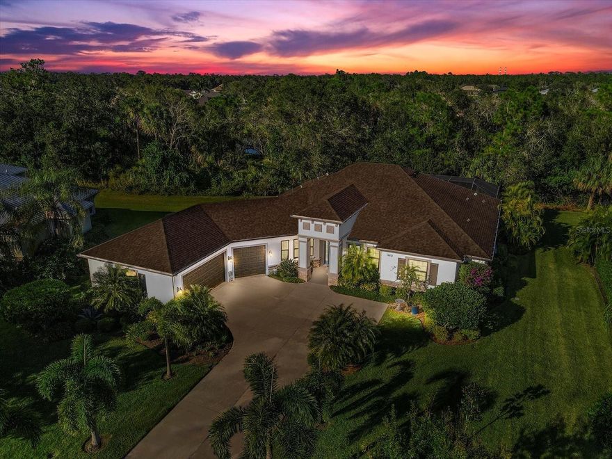 2020 Custom Saltwater Pool & extended Lanai, .44 Acre, Air Conditioned 3.5 Car 44x21 ft Garage, 8 Hurricane Windows, Custom Hurricane Screens, Outdoor Kitchen, 46x28 ft lanai, No Neighbors behind or across the street, 2600 sq ft, 3 EnSuite Bedrooms & Study, 4 Baths, No CDD taxes, Low HOAs. Home Warranty Included w/ Sale. Medallion Caicos model award winning open floor plan.  Residing on just under ½ ACRE, this flawless 2600 sq ft Saltwater Pool (2020) home boasts 3 king size EnSuite BEDROOMS, 4 BATHS plus STUDY with no neighbors across the street (lovely pond) or behind (beautiful preserve).  As you walk through the glass front door you will be immediately impressed by this exceptional open Floor Plan. Panning past the dining room, into the wide-open Great room with its tile flooring & trey ceiling and then leading you into the detailed kitchen. This gourmet kitchen will not disappoint with its upgraded granite, Custom Lg Granite sink, walk in pantry, upgraded two tone 42 inch cabinetry, Island, Eat at Breakfast bar, Stainless Steel Appliances and ample counter space to cook and entertain.  The kitchen also features an extra-large aquarium window w/ a fantastic view to the 3 YEAR YOUNG SALT WATER POOL AND EXTENDED PAVER LANAI (2020)!  That is a view you will love to wake up to!  When it comes to Lanais this one will be hard to beat….. added by the owners in 2020!  This oversized, 46 x 28 Ft paver lanai w/ 14 feet under cover area, 3 ceiling fans, recessed lighting, and plenty of room for furniture is perfect for entertaining all your family & friends.  Custom color changing lighting has been added to the posts of the lanai & looks amazing at night.  OUTDOOR KITCHEN w/ granite countertop, eat at bar, Grill, fridge & sink. This split floor plan makes this oversized Master EnSuite totally private w/ his & her walk in closets and private bath making it the perfect oasis at the end of a long day.  The bath has a soaking tub w/ separate tile walk in shower, dual granite sinks, & upgraded lighting.  All three King Size Bedrooms are EnSuites, walk-in closets & all baths have upgraded granite & cabinetry.  This AIR CONDITIONED 3.5 SIDE LOAD courtyard GARAGE w/ epoxy flooring has storage cabinets, built in shelving & an additional door added by the builder to access side yard.  Additional upgrades added after closing include 8 HURRICANE RESISTANT WINDOWS along the front of the house, custom HURRICANE SCREENS FOR LANAI so your outdoor furniture can stay in place, HURRICANE AWNINGS for side windows 2021, Uplighting on landscaping & Custom Window treatments. Twin Rivers offers private walking trails, a PRIVATE BOAT RAMP and kayak launch to the Manatee River only for owners.  Located close to numerous gorgeous beaches, golf courses, shopping, and entertainment.  Also, close to I75 and conveniently between Tampa or south to Sarasota. There are too many upgrades in this house to list…..you must come for a private tour.  Home Warranty Included. Check out our virtual tour: https://nodalview.com/s/3PWhkF-P55MPlLK2KXcz8U