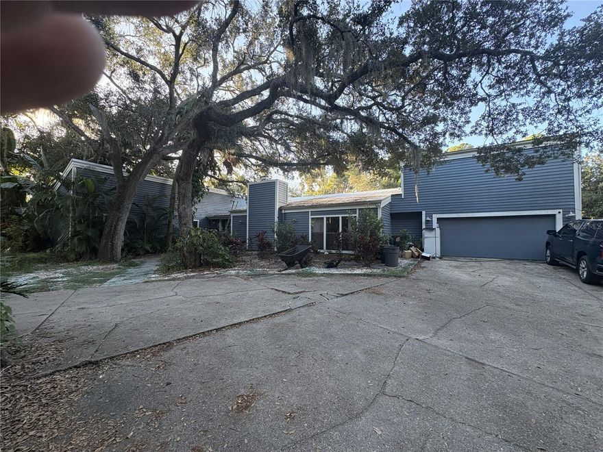 PRICE CHANGE!!  Fixer-Upper  Heavy remodeling needed. This property is one that you need to drive by to see if it's for you. Beautiful property tucked away from traffic (east of 75) Beautiful community with all homes on 2 acre lots. A 2 story house with metal roof, pool with spa, 2 car garage, carport for 4 cars or large camper.  The well and septic needs to be maintained, Building in back for parts will be torn down.