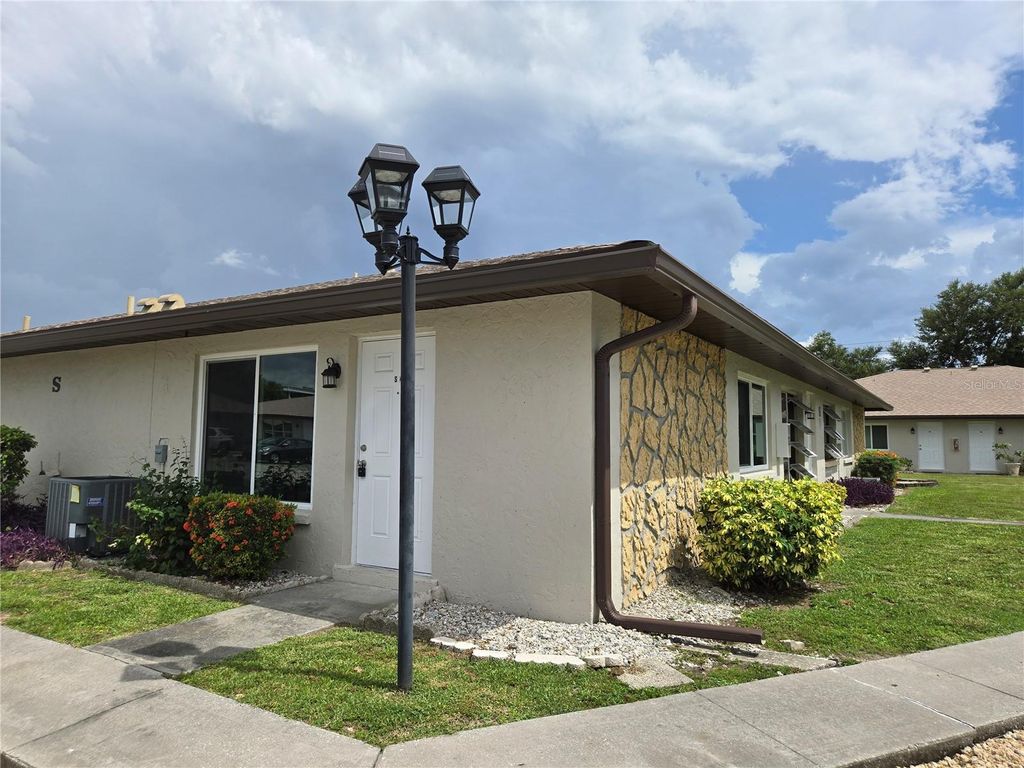 Photo of 21150 Gertrude Avenue #S4, Port Charlotte, FL 33952 (MLS # C7512749)