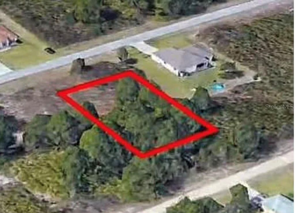 Photo of 720 Peacock Avenue, Lehigh Acres, FL 33974 (MLS # O6392938)