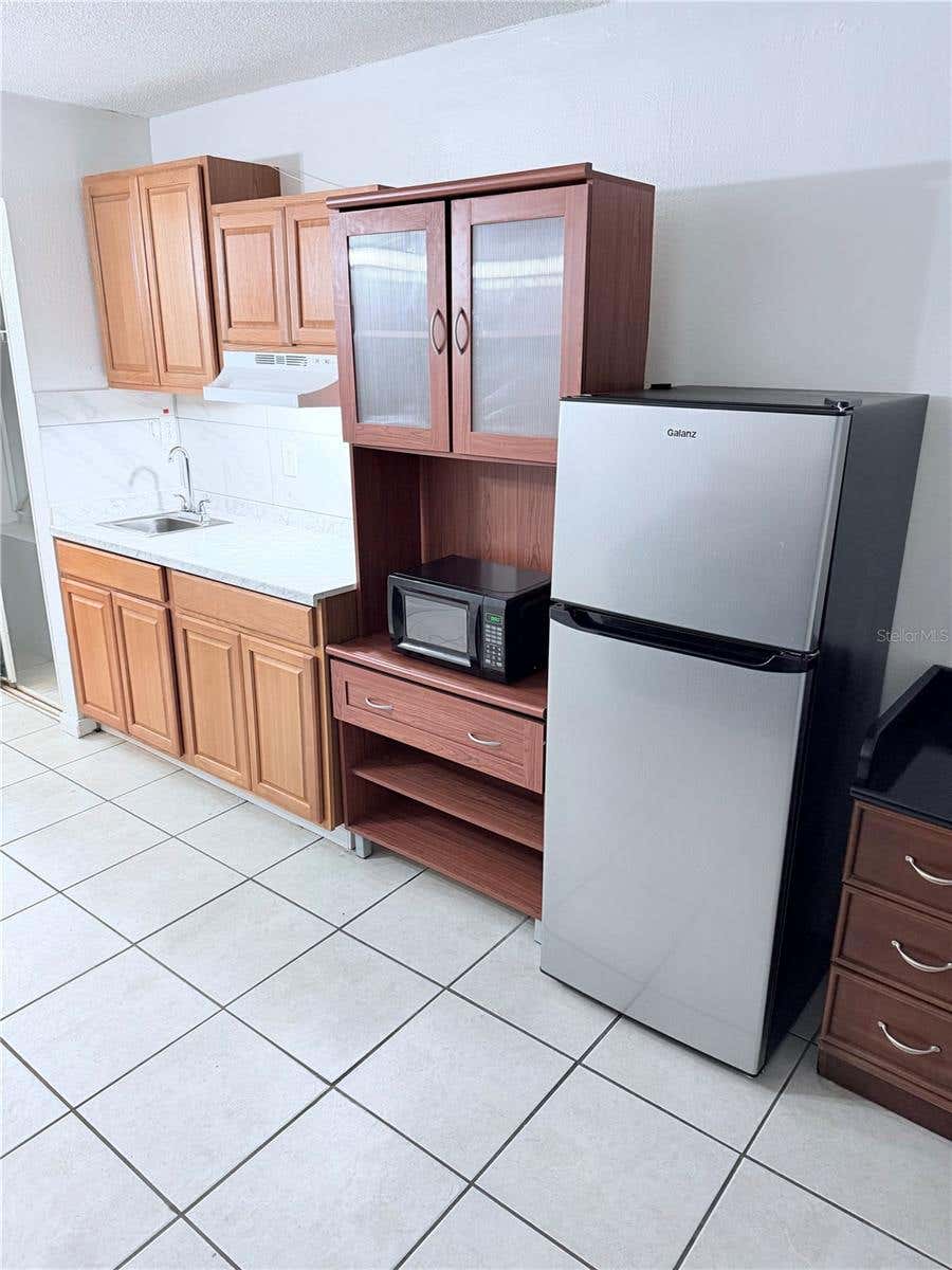 Photo of 43420 Highway 27 #436, Davenport, FL 33837 (MLS # O6435276)