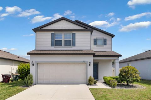 Photo of 1793 Cayman Cove Circle, Saint Cloud, FL 34772 (MLS # O6394619)