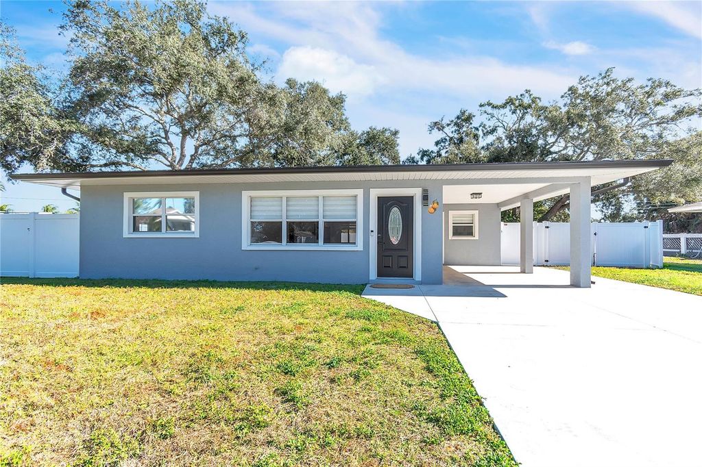 Photo of 2049 Woodward Avenue, Dunedin, FL 34698 (MLS # TB8460494)