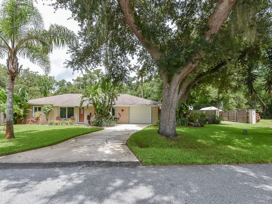 Meticulously kept 3 bedroom, 2 bath home with beautiful, large, screened in saltwater pool and hot tub, plus a large deck area and fire pit all within a very private fenced yard. Adjacent lot was purchased and fenced and has 12 x 20 Air conditioned work shop and room for boat or RV parking. Remodeled kitchen features beautiful granite, GE Profile, 5 burner gas stove and oven w warming drawer, drawer microwave and Bosch Dishwasher. Master bathroom and guest bathrooms recently remodeled. All new hurricane windows and doors. Beautiful landscaping, single car, air conditioned garage, wine bar. ;Water: City