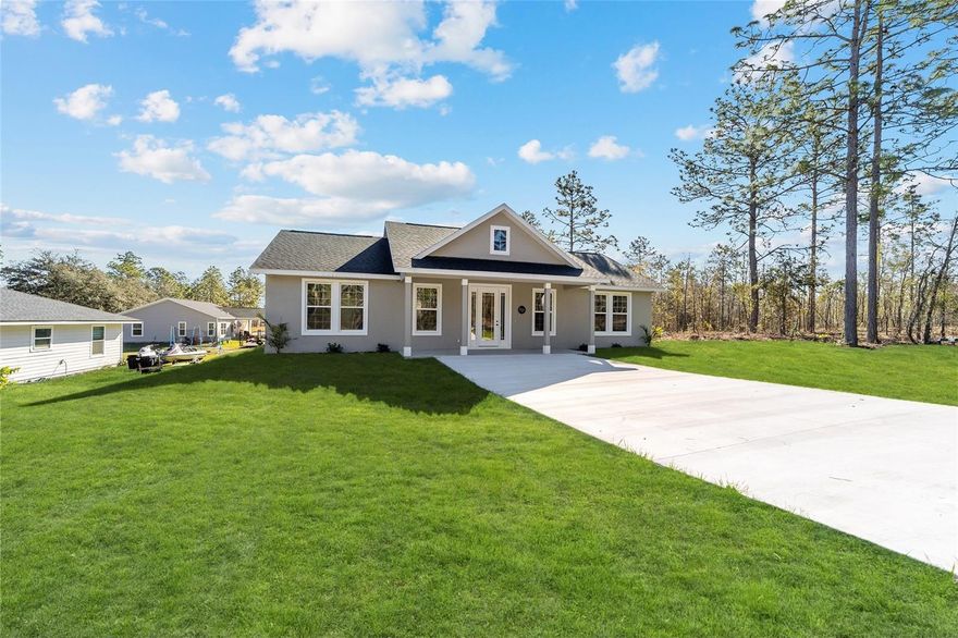 BRAND NEW Construction Modern Farmhouse Available for Rent! Nestled in the up-and-coming Williston Highlands! This stunning custom built 3 bedroom, 2 bathroom + office/flex room home offers the perfect blend of modern design and comfortable living. Prime Location!! 15 minutes to HITS and just 20 minutes to Gainesville and 30 minutes to Ocala and The World Equestrian Center! You’ll enjoy the best of both worlds—small-town charm with easy access to city amenities. This spacious, open concept floor plan offers ample natural light throughout the home, modern fixtures and fine finishes. MANY UPGRADES! This new construction block Home features a beautiful split floorplan with vaulted ceilings in the main living area. The heart of the home boasts a combination kitchen / dining room with a raised island for guest seating. The builder spared no expense when designing! The chef's kitchen features quartz countertops, top-of-the-line appliances, upgraded cabinetry with soft-close hinges and ample counter space, plus a custom built-in workspace! The kitchen and dining area seamlessly flow into the expansive great room, making it perfect for entertaining. The luxurious master en-suite is a true retreat, featuring a curb less walk-in shower with luxury designer tile and glass enclosure and beautiful farmhouse garden tub, dual vanities, quartz countertops and upgraded fixtures. Not to mention, the large windows and massive walk-in closet! The second and third bedrooms are also great in size and feature large windows, a walk-in closet, remote controlled ceiling fans and are located on the other end of the home for added privacy. The guest bathroom features a shower/tub combo with luxury tile, quartz countertops and modern farmhouse style sink and fixtures. In addition to the 3 bedrooms, there is a full inside laundry room with built-in shelving, plenty of storage space and an added flex room that could be an office or mudroom! Relax on the oversized covered lanai, great for entertaining and taking in this beautiful backyard view! This home includes features and finishes hand-selected by our professional designers to provide you with enduring style, move-in convenience, and easy home maintenance! This energy-efficient home boasts premium finishes throughout, such as, luxurious low-maintenance and waterproof vinyl plank flooring throughout (NO CARPET!), Energy-efficient LED lighting, Double-pane Low-E windows, Fully sodded homesite, Quartz countertops, Soft close cabinetry, Custom backsplash, Remote controlled ceiling fans, High end appliances and finishes package and more! Located on the peaceful outskirts of Williston, this home offers a serene retreat with easy access to Gainesville, Ocala, and the Nature Coast—making it convenient for both work and leisure. Schedule a tour today!