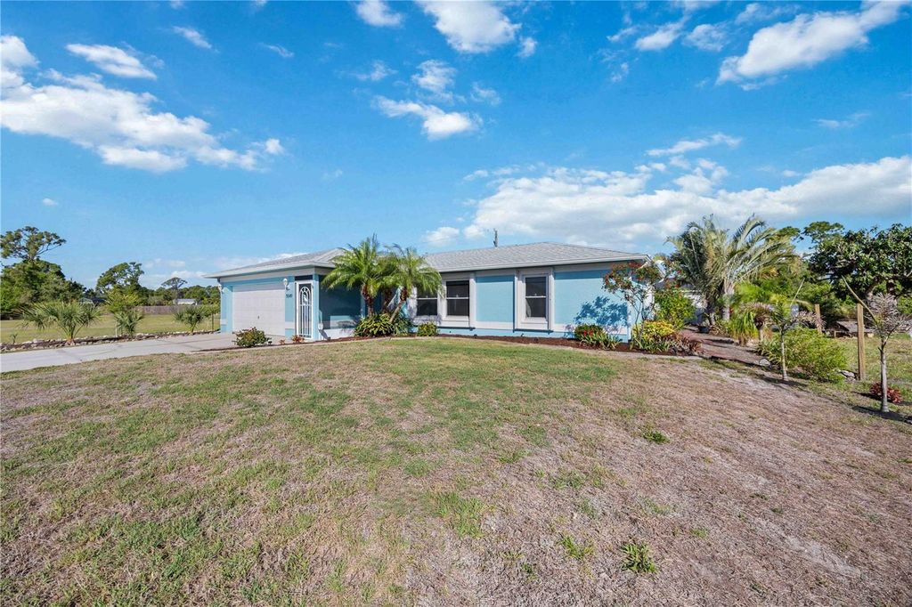 Photo of 5549 Eyerly Terrace, Port Charlotte, FL 33981 (MLS # N6144021)