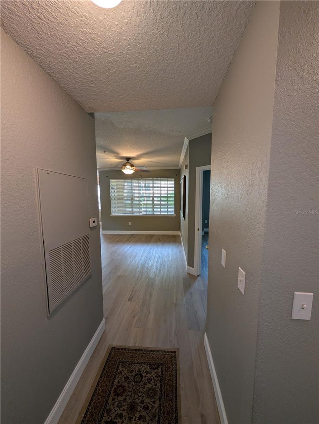 Photo of 2632 Robert Trent Jones Drive #110, Orlando, FL 32835 (MLS # O6405302)