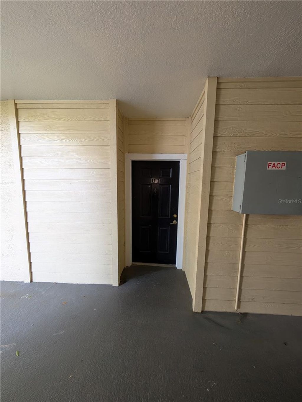 Photo of 2632 Robert Trent Jones Drive #110, Orlando, FL 32835 (MLS # O6405302)