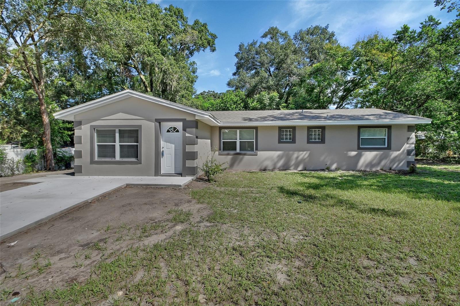 Move in Ready and super cute, 4 bedroom 1 1/2 bath home with new large parking pad out front. This home has everything you need and has been newly painted and updated with Granite Counters, New Roof and New AC. New flooring so no carpet in this home! This property is fully fenced so no worries about your furry friends getting out. Great location with being only minutes away from the Famous Downtown Deland with all the great restaurants and events they have to offer. Only a few minutes drive to hop on I-4 and head over to the beaches just 30 minutes away, or only a 45 min drive over to Orlando. Conveniently located as well to shopping, medical facilities and lots of restaurants. Give us a call today for your private showing of this Gem!