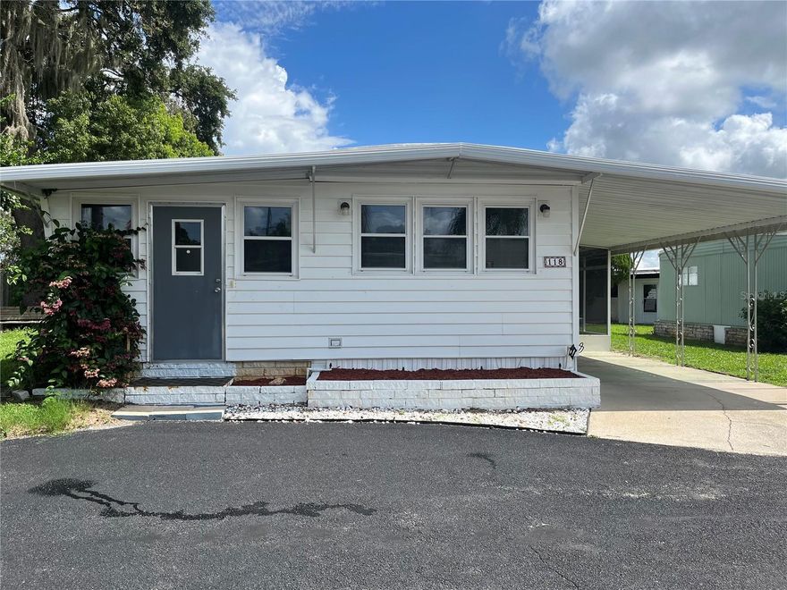 OWNER WILL CONSIDER OWNER FINANCING with 20% down and 5% interest! Discover the serenity of a community of lakeside living in this updated 2-bedroom, 2-bathroom manufactured home nestled in the heart of Brittany Estates, a 55+ community. Embodying the essence of cooperative community living, ownership includes a share granting access to outstanding amenities and a vibrant social scene. Step through the threshold and into a home transformed by thoughtful renovations, featuring state-of-the-art 200 amp underground electrical service and new subflooring paired with contemporary vinyl plank flooring throughout. The front room has been ingeniously repurposed to offer additional living space, perfect for an inviting office or cozy den. Indulge in the Florida sunshine from your own enclosed and screened side lanai, complete with a designated area housing a newer washer and dryer. This versatile space not only extends your living area but also provides a tranquil haven to relax and rejuvenate. Brittany Estates caters to your every whim with a wealth of amenities designed to enrich daily life, including a year-round heated pool for endless enjoyment, and a clubhouse ideal for hosting memorable gatherings. Water enthusiasts will relish the exclusive access to Lake Griffin, with the option, when available, for covered boat slips equipped with lifts. A well-appointed clubhouse offers the perfect setting for socializing with neighbors, while outdoor enthusiasts can partake in friendly games of shuffleboard or horseshoes. For those who appreciate the allure of fishing, a private pier beckons on the shores of Lake Griffin. Conveniently encompassed within the cooperative community, the modest monthly association fee of $157 covers access to all amenities, along with essential services such as grounds maintenance, trash removal, and water and sewer. Don't miss the chance to embrace the quintessential lakeside lifestyle in Brittany Estates. Seller financing options available, inquire with our dedicated listing agent for details. Pet lovers rejoice—this community welcomes one pet weighing up to 25 lbs. Experience the allure of lakeside living at its finest—schedule your private tour today! Contact us now to seize this remarkable opportunity to claim your piece of paradise in Brittany Estates. All information deemed reliable; buyer verification required.