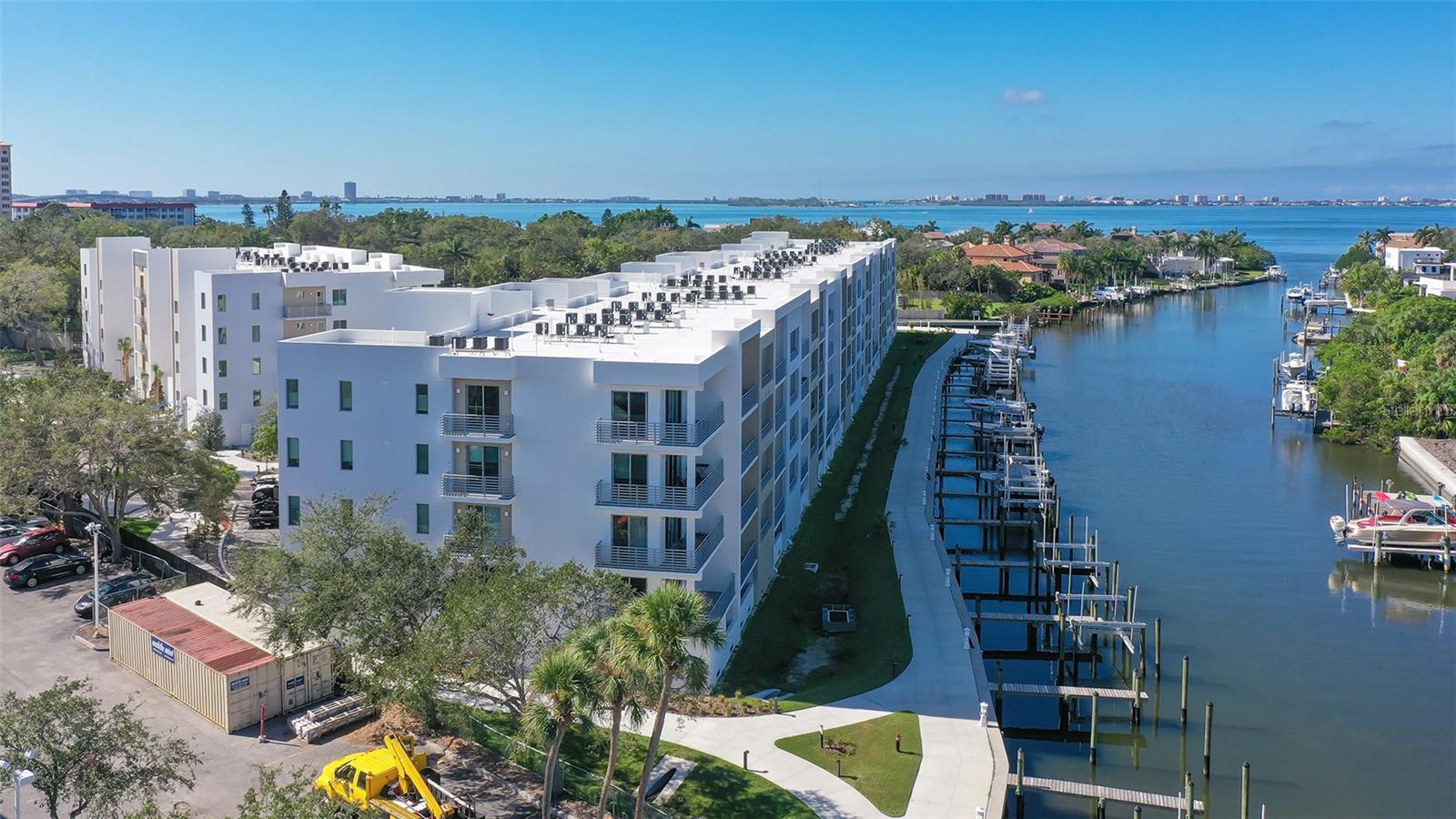 Waterfront Living at The Strand – 1BR + Den Condo with Boat Slip
Never-lived-in condo with private boat slip in The Strand, a gated waterfront community on Whitaker Bayou with direct access to Sarasota Bay and the Gulf of Mexico. This bright and spacious 1 bedroom + den, 2 bathroom unit features an open floor plan with sliders leading to a wide terrace, ideal for outdoor enjoyment.
The well-appointed kitchen includes stainless steel appliances, quartz countertops, and modern cabinetry. The primary suite offers a walk-in closet and en-suite bath. A separate den with closet provides flexible space for guests or a home office.
Additional features include:
Covered parking under the building
Dedicated storage unit
In-unit laundry
Option to lease furnished or unfurnished
The Strand offers a host of resort-style amenities including a heated pool and spa, fitness center, kayak/paddleboard launch, dog walking area, fishing spots, outdoor grills, and electric car charging stations.
Conveniently located just one mile north of downtown Sarasota, close to Ringling College, New College, SRQ Airport, St. Armands Circle, Lido Beach, and Longboat Key.