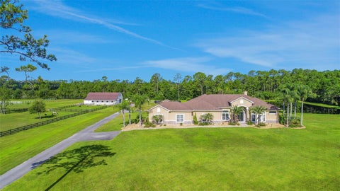 Photo of 260 Spring Forest Drive, New Smyrna Beach, FL 32168 (MLS # O6428050)