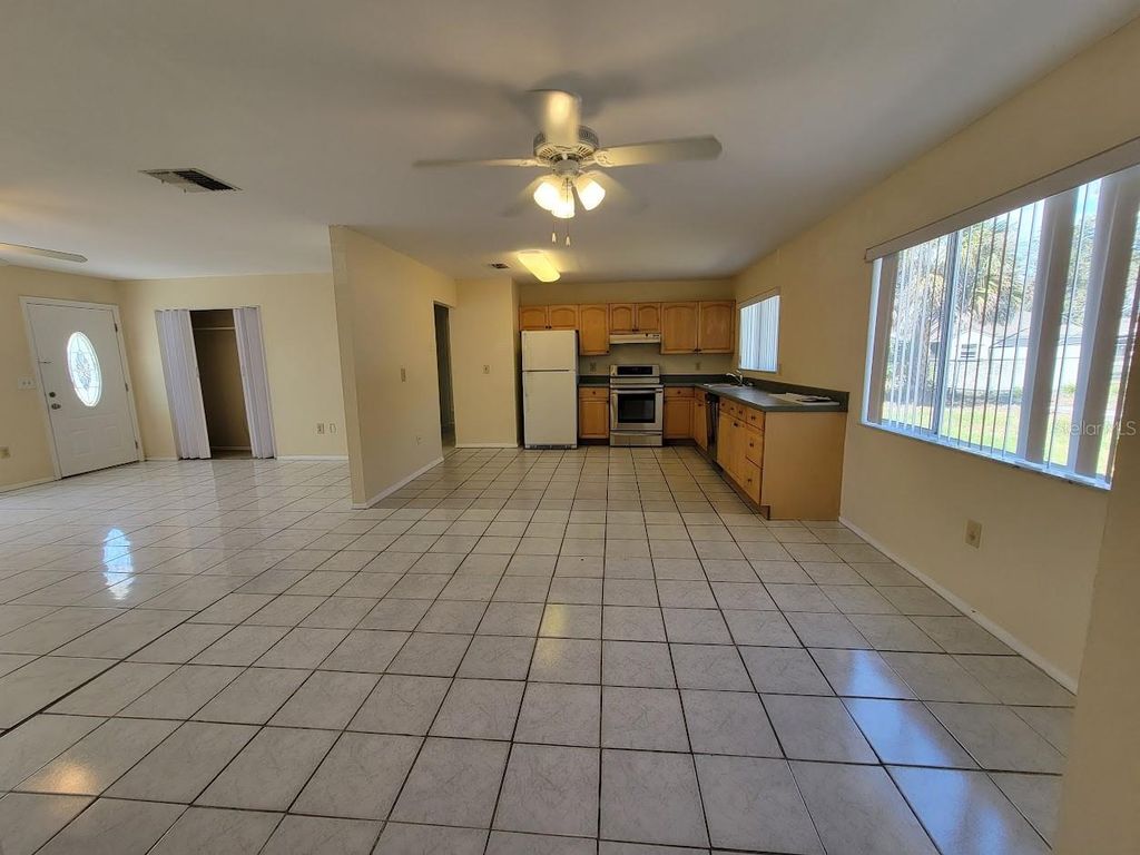 Photo of 2466 Lakeshore Circle, Port Charlotte, FL 33952 (MLS # A4685880)