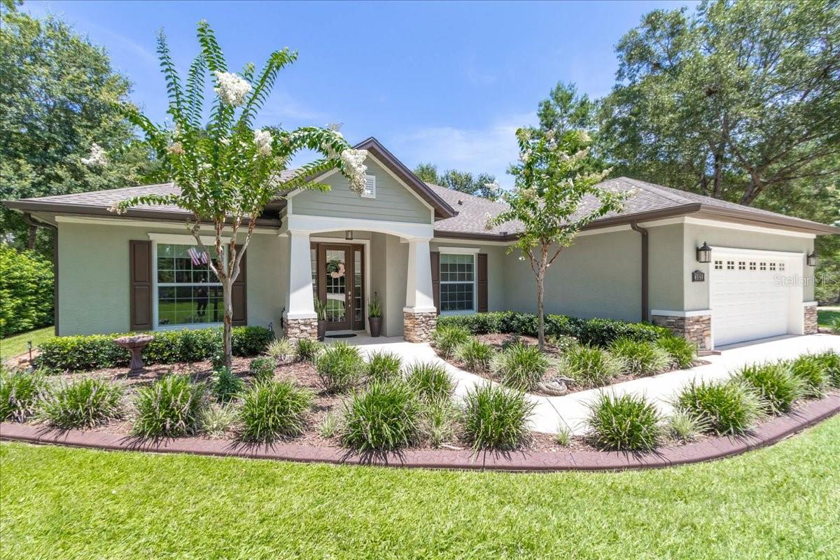 Welcome to this CUSTOM BUILT, meticulously maintained and MOVE IN READY home nestled on 8.75 acres in a serene and private setting, located directly on the 70,000 acre Marjorie Harris Carr Cross Florida Greenway Preserve. This ONE OWNER ESTATE offers beautiful finishes, thoughtful design, and the freedom of no HOA—perfect for those seeking luxury with privacy and flexibility.
The well-designed open concept, split floor plan features 3 bedrooms, 2 bathrooms, and a spacious office/den—ideal for remote work or a creative space. Inside, you’ll find 9 FOOT CEILINGS throughout, a striking double tray ceiling in the great room, arched hallways, ceiling fans with integrated lighting, wood cased double paned windows with custom window shades, wood cased custom doors, 6 inch baseboards and timeless architectural elements. There is an alarm system, exterior lighting, water softener and water filter as well.
The heart of the home is the gourmet kitchen, showcasing a massive center island with custom pendant lighting, granite countertops, tile backsplash, stainless steel farmhouse sink, stainless steel appliances, solid wood cabinetry with designer hardware and a large closet pantry. A large window provides peaceful backyard views.
The spacious primary suite features dual walk-in closets with pocket doors and a spa-like ensuite with a soaking tub, large tiled glass enclosed shower, dual vanities, linen closet and private water closet.
Two spacious secondary bedrooms share a full bathroom with a tub/shower combo with glass doors and a linen closet.
Practicality meets comfort in the oversized interior laundry room with utility sink and spacious 2-car attached garage, equipped with built-in shelving, water line for icemaker, remote garage door opener, and keyless entry.
Step outside and enjoy the Florida lifestyle with a screen-enclosed, heated saltwater pool, covered lanai with dual ceiling fans, and gorgeous views of the pond, wooded property, and surrounding nature. You will find this area very private and will appreciate the mature and meticulously maintained landscaping complete with custom concrete curbing and an automatic irrigation system.
Outbuildings and land features a 330’ X 12' gravel driveway with automatic electric gate and remotes, 40' x 44' OUTBUILDING with metal roof, including a 12' x 30' integrated WORK SHOP with roll-up & walk-in doors, WATER, ELECTRIC and a 30 amp generator hookup. An additional 24' x 25' METAL POLE BARN with gravel base and 9' x 24' lean-to is located directly behind the main outbuilding for convenient additional storage and/or work space. Plenty of room for all of your boats, UTV's, RV's, equipment, etc.
The home and outbuildings sit on approximately 2 acres; an additional 2 acres include a pond/marsh area and the remaining acreage is wooded with cleared trails—perfect for hiking, UTV adventures, or peaceful nature walks.
Situated on a quiet private road, lined with custom homes and bordering the expansive Greenway Preserve, this exceptional property offers unmatched privacy, tranquility, and natural beauty—just MINUTES from Hwy 200, I-75, Hwy 484, shopping, dining, medical facilities, and all that Ocala has to offer.
This is a truly ONE OF A KIND PROPERTY—schedule your private tour today and discover the perfect blend of luxury, freedom, and nature-inspired living.