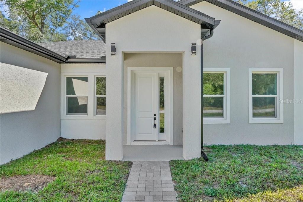 Photo of 10577 N Umber Terrace, Citrus Springs, FL 34434 (MLS # O6372790)
