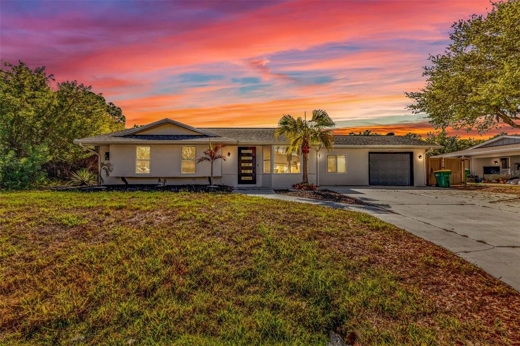 Photo of 923 Linnaen Terrace NW, Port Charlotte, FL 33948 (MLS # C7523265)