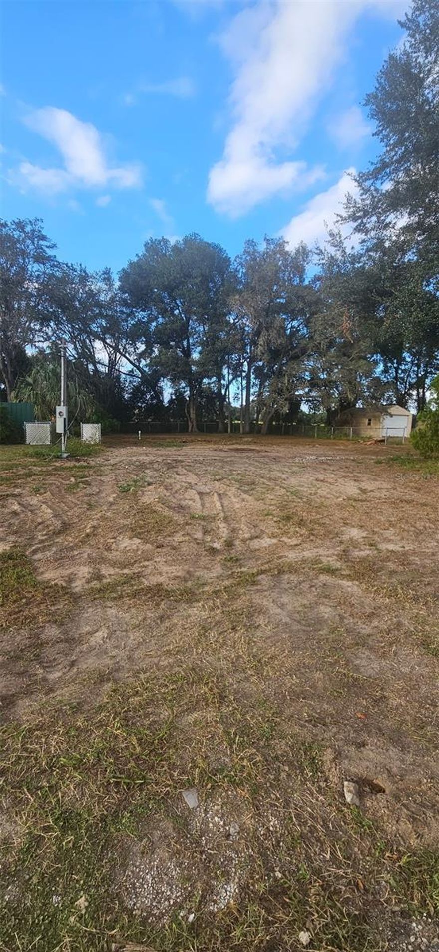Looking for freedom and flexibility near The Villages? This ready-to-build property is your opportunity to create the Florida lifestyle you’ve been dreaming of—without HOA or CDD limits. The lot is cleared, fenced, and already equipped with a well, septic, and electric hook-up. Plus, no impact fees for almost two more years means more savings to put toward your design. Whether you’re an investor or future homeowner, this is where your next chapter begins.