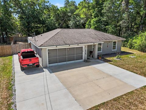 Photo of 19056 Saint Benedict Drive, Dunnellon, FL 34432 (MLS # OM723484)