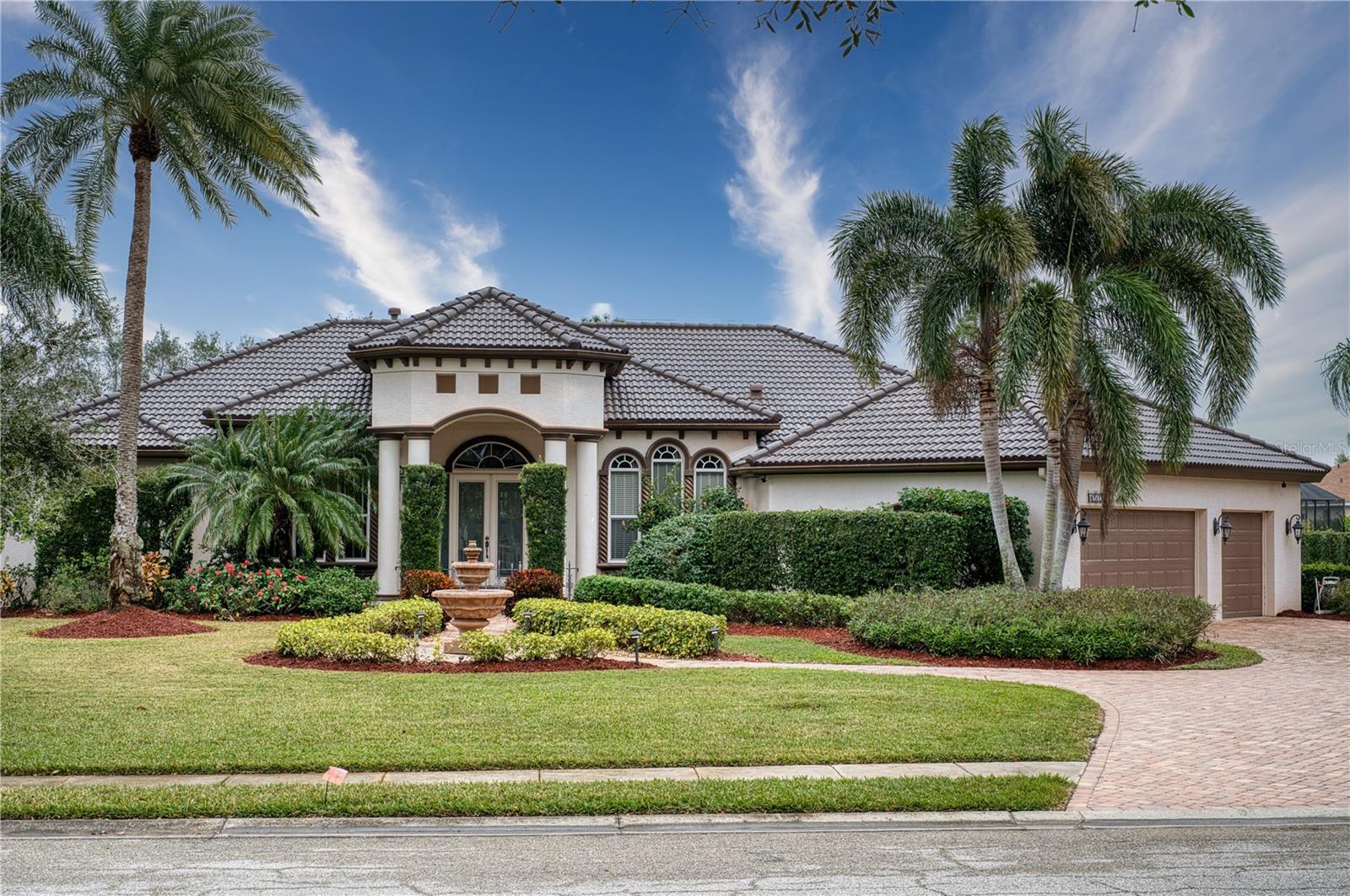 New Roof! Welcome to this absolutely charming, one-of-a-kind customized dream house. Uncover an extraordinary treasure in the highly sought after River Club community. This impeccable single family home is a hidden gem in a peaceful and picturesque community. This expansive home features four bedrooms, plus a den, three baths and TWO bonus rooms. Surrounded by meticulously maintained landscaping creating a tranquil oasis. As you step through the double front doors, a sunken living room greets you and warmth radiates through the gas fireplace. The office and formal dining room showcase the stunning view of the pool and spa.
The gourmet kitchen is a chef's dream featuring newly painted cabinets, breakfast bar, island with a dinette breakfast nook with a large aquarium window overlooking the pool.
The primary suite is in its own private wing and boasts views of the pool. The suite features a recently customized walk-in closet that is the entire length of the bedroom. On the opposite side of the home, you will find three additional bedroom suites, including a jack and jill bathroom.
Step outside to the resort-like pool, spa and fountain. Surrounded by pavers and a new outdoor kitchen and pool cage.
Upgrades include three beautiful tray ceilings, newly installed hardwood floors in the den and guest room, and a brand new tile roof (12/24) for peace of mind for years to come. Low HOA and no CDD fees.
This one-of-a-kind rare estate is close to UTC and I-75 is for a buyer seeking sophistication, luxury, and convenience.