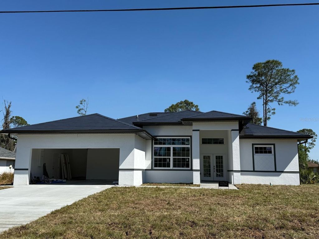 Photo of 2551 Alhaven Terrace, North Port, FL 34286 (MLS # D6143390)