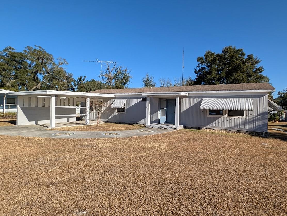 2/2 home with 1338 sq ft is located in a quiet Community Large living room, built-in cabinets in dining area, light and bright kitchen, separate den/family room area, large master bedroom with multiple closets including a walk-in closet in. Sliding glass doors lead to vinyl enclosed screened porch and attached utility room with washer dryer. Equal Opportunity Housing.
