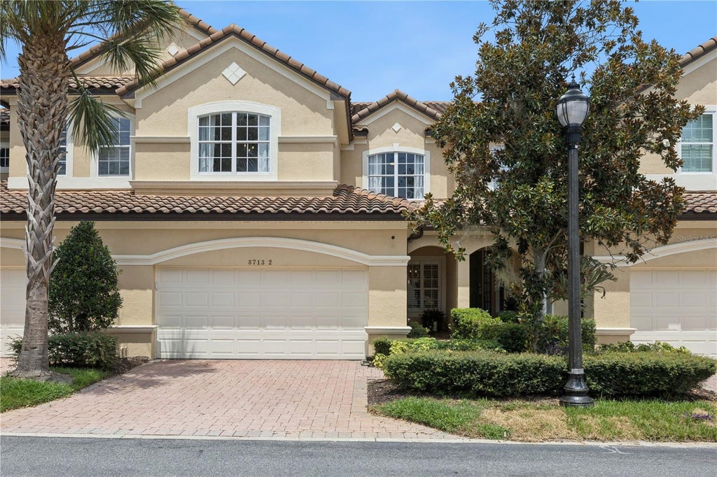 Photo of 8713 The Esplanade #2, Orlando, FL 32836 (MLS # O6434964)