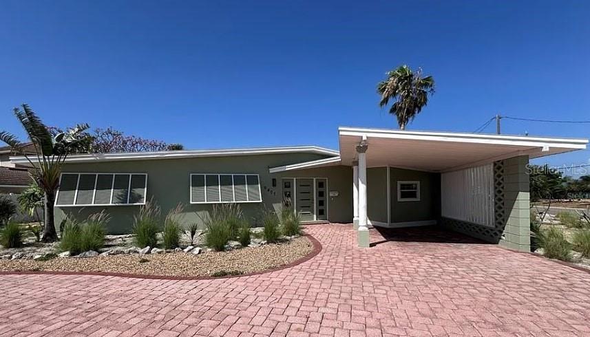 Your Dream Home Might Just Be Waiting! Come see for yourself
Modern Coastal Living Just Minutes from the Beach!
Step into a beautifully reimagined coastal residence just three blocks from the award-winning shores of St. Pete Beach. Designed for comfort, convenience, and style, this thoughtfully upgraded home offers a seamless blend of modern finishes and timeless Florida charm.
Inside, you'll find an airy layout filled with natural light, enhanced by freshly reconditioned terrazzo flooring and brand-new laminate throughout the spacious family room and expanded primary suite. The heart of the home—a completely renovated kitchen—features all-new cabinets, quartz countertops, a sleek tile backsplash, and a full suite of brand-new appliances, including a natural gas range for culinary enthusiasts.
Both bathrooms have been tastefully updated with new vanities and stylish tiled shower wainscoting, while the laundry area now includes fresh tile flooring for added durability. A tankless water heater ensures endless hot water, and impact-rated front windows and doors provide peace of mind and energy efficiency.
The exterior has also seen a transformation, with a fresh coat of paint and a pavered circular driveway that offers generous parking for guests. Step out back to unwind in your private yard with tranquil water views, perfect for soaking in the sunshine or enjoying evening breezes.
With a newer roof already in place, this home is move-in ready and maintenance-light—ideal as a permanent residence or a vacation getaway. Located just minutes from the vibrant Corey Avenue district, beachside restaurants, and boutique shops, you’ll be immersed in the best of the St. Pete Beach lifestyle.
To top it off, the property just got an appraised value of $953,000 and it is being listed below value in order to give the new owners over $20,000 in equity for any customization or simply for money in the pocket!
Come experience coastal living at its finest—schedule your private tour today!