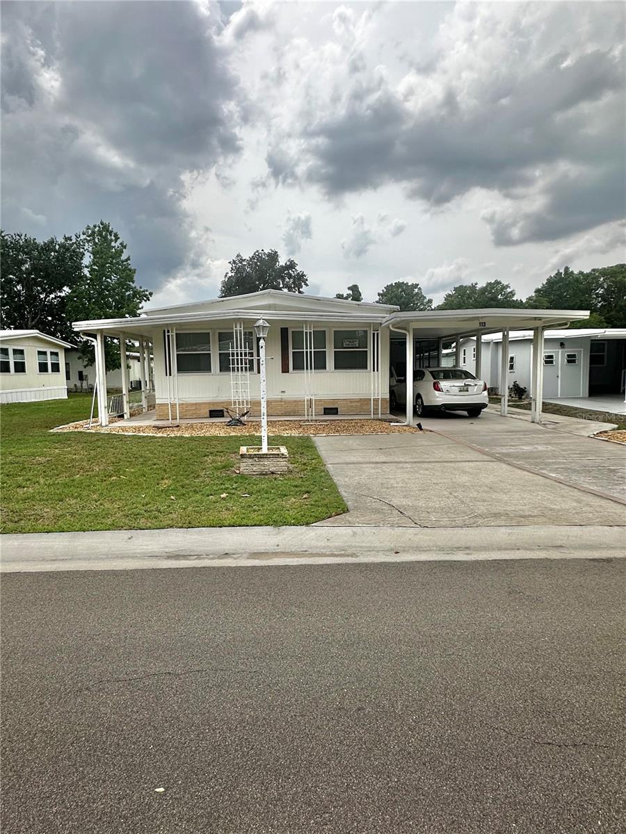 Another $5000 price reduction, altogether since listing $25,000. VERY MOTIVATED SELLERS, BRING THEM AN OFFER!!!
New updates as of May 2025- pressure washed outside/driveway, painted built in cabinet in dining room, painted doors and an accent wall, new dishwasher May 2025, the home has been cleared of personal items(most), and the carpets have been steam cleaned.
Welcome to the Continental Country Club an active 55+ community close to shopping and restaurants. This 1973 2 bedroom 2 bath double wide manufactured home has 1440 sq feet under heat/air, This home has been meticulously maintained with 2019 membrane roof. Laminate and Carpet throughout the home, you have a family room AND living room. Your formal dining room has built in cabinets giving you ample amount of storage space. A very spacious side screened lanai. Next to lanai area you have your laundry room and the washer and dryer are included in the sale of the home. walking past your laundry room through a glass screened door you have a storage room and your gold cart garage.
Don't miss your opportunity to own and be apart of an amazing community that offers arts & crafts, Ballards / Table Tennis Room, Boating/ fishing, Bocce ball courts, Fitness center, Golf, Lending Library, Pool, Restaurant, Pickle ball / Tennis courts, Shuffleboard, Softball field & Pavilion, Veterans Memorial park, Woodwork shop.