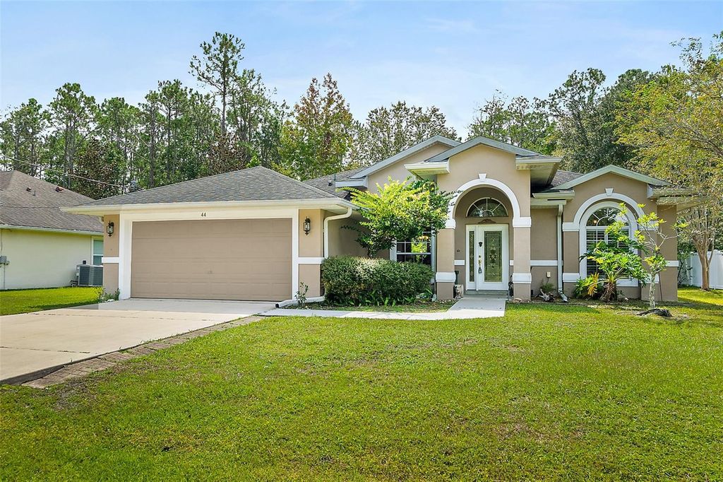 Photo of 44 Kathleen Trail, Palm Coast, FL 32164 (MLS # FC312948)