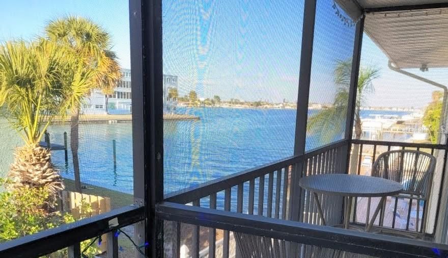 Welcome to Condo Unit 204, a second-floor residence in a beautifully maintained waterfront community, offering breathtaking intracoastal views and easy access to the Gulf beaches—less than 2/10th of a mile to the sandy beach. This 1-bedroom, 1-bath, fully furnished, turn-key home was untouched by the 2024 storms, providing added peace of mind. This unit includes a reserved parking space, and there is additional guest parking available as well.

Inside, you’ll find a spacious open-concept layout connecting the kitchen, dining, and living areas—ideal for both everyday living and entertaining. The primary bedroom features a walk-in closet, and the unit includes extra private storage conveniently located very close to the front door, a rare and valuable bonus.

Residents enjoy a scenic community pool overlooking the intracoastal, along with two oversized patio areas perfect for relaxing in the sun or gathering with friends to enjoy the views. Additional community features include common-area laundry and clotheslines. The HOA has recently completed major upgrades, including a new water heater, new fencing, and full sewer line replacement—with the assessment already paid in full. New landscaping is scheduled for completion within the next month, further enhancing the community’s appeal.

Tucked away in a quiet, tranquil setting, yet just minutes from lively restaurants, social hangouts, and local attractions, this condo offers the perfect balance of serenity and convenience. Make the beach life your reality—schedule your private showing today.