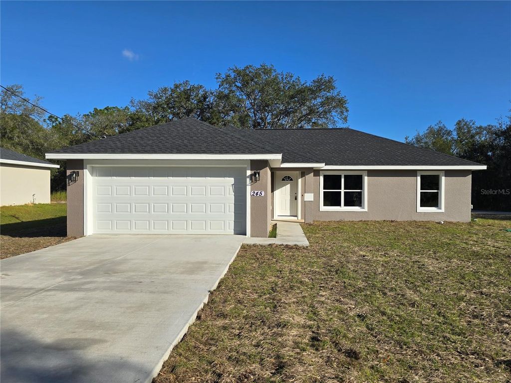 Photo of 245 Locust Pass Ln, Ocala, FL 34472 (MLS # OM715558)