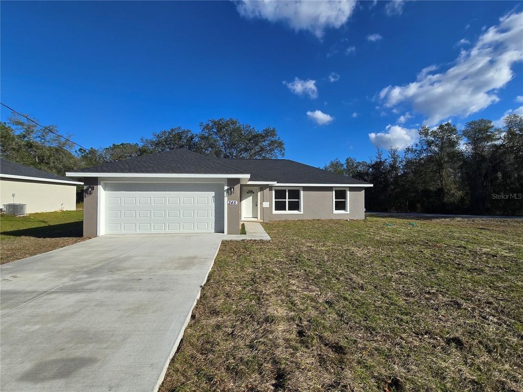Photo of 245 Locust Pass Ln, Ocala, FL 34472 (MLS # OM715558)