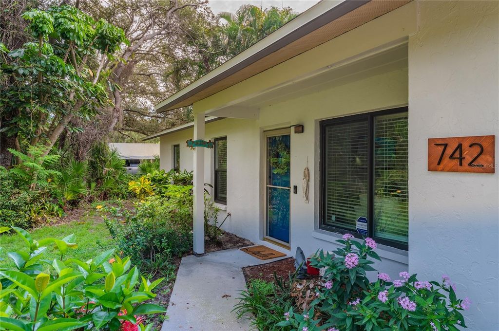 Photo of 742 Harms Drive, Osprey, FL 34229 (MLS # A4666421)