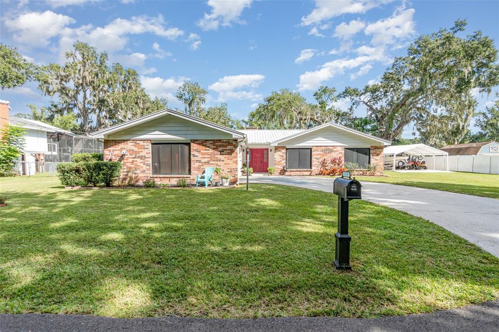 Photo of 1004 Monterey Drive, Leesburg, FL 34748 (MLS # O6352275)