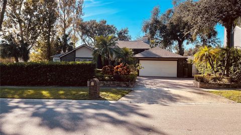 Photo of 6850 Spring Rain Drive, Orlando, FL 32819 (MLS # O6382928)
