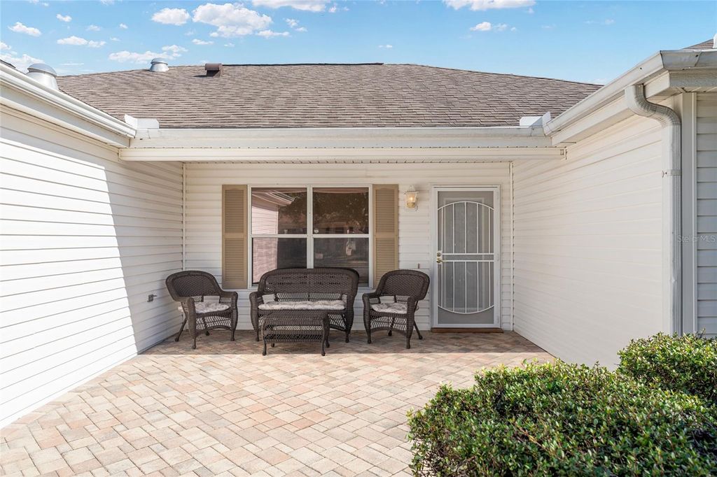 Photo of 411 Aldama Avenue, The Villages, FL 32159 (MLS # G5105097)