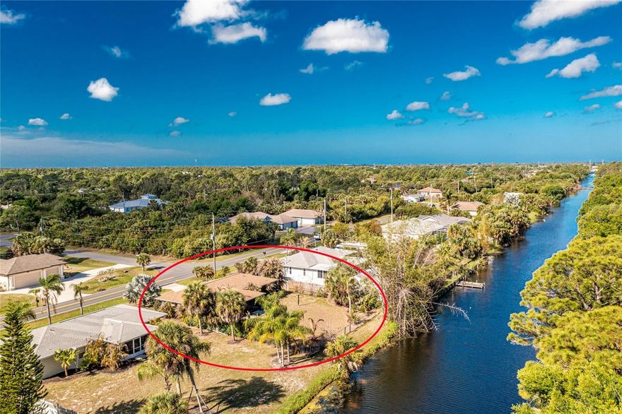 Come see this well priced waterfront home in East Englewood in preferred flood zone X500, so no flood insurance should be required!  Great neighborhood centrally located to parks, schools, restaurants, shopping plazas, medical facilities and Englewood's pristine beaches on Manasota Key!  Enjoy your own private access to the Newgate Waterway, offering miles of exploration.  This 2 bedroom home offers an updated kitchen with a dinette and a separate dining room, 1 car garage, 2 bedrooms each with their own walk-in closet and spacious lanai with a pass through service window to the kitchen.