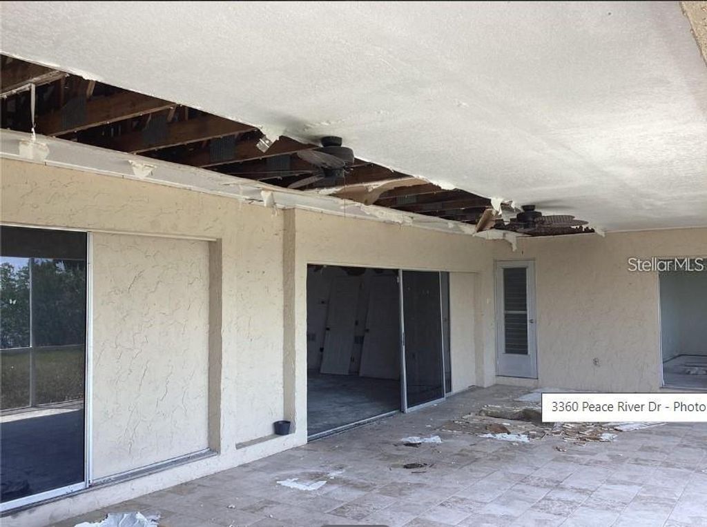 Photo of 3360 Peace River Drive, Punta Gorda, FL 33983 (MLS # O6389705)