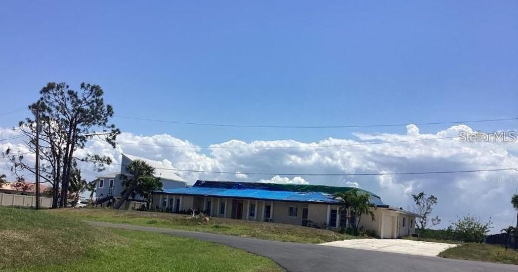 Photo of 3360 Peace River Drive, Punta Gorda, FL 33983 (MLS # O6389705)