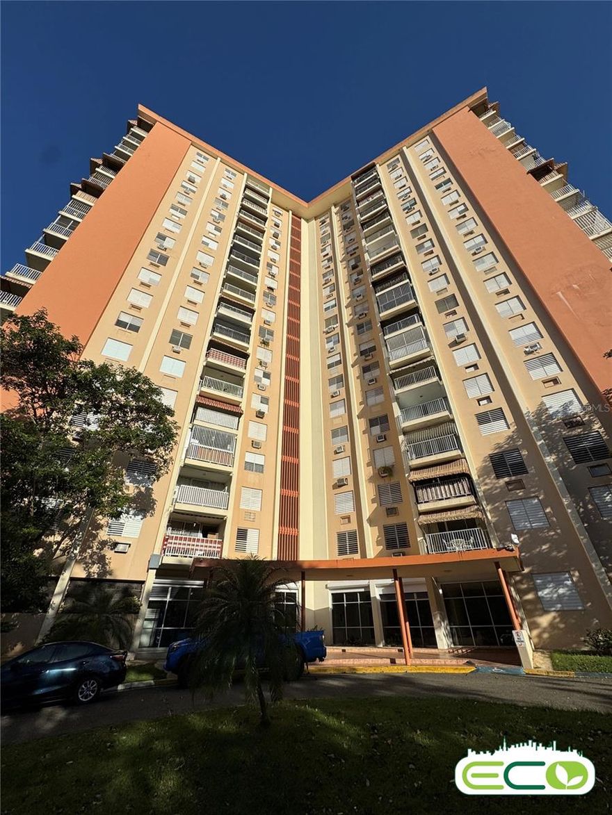 Prime-location apartment in the heart of San Juan with panoramic views. It features 3 bedrooms and 1 remodeled bathroom, a walk-in closet in the primary bedroom, a living-dining area, kitchen, storm-proof security door, and a spacious outdoor balcony. The apartment is located in a complex with recreational amenities including a swimming pool, tennis and basketball courts, an activity area, and a walking trail surrounded by nature. Rent includes maintenance and water. 24/7 security.