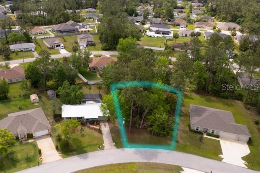 Discover the perfect spot to build your dream home in the heart of Palm Coast! This partially cleared lot is ideally located just minutes from the beach, shopping, dining, and everyday conveniences. Enjoy easy access to the nearby bike path, perfect for outdoor enthusiasts who love walking, jogging, or cycling. Nestled in a prime location, this property offers the best of coastal living with the convenience of being right in the middle of town. Don’t miss this opportunity to create your ideal Florida lifestyle!  The lot will be split at closing.